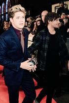 Louis Tomlinson : TI4U1404592364.jpg