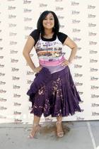 Raven-Symoné : TI4U_u1140567652.jpg